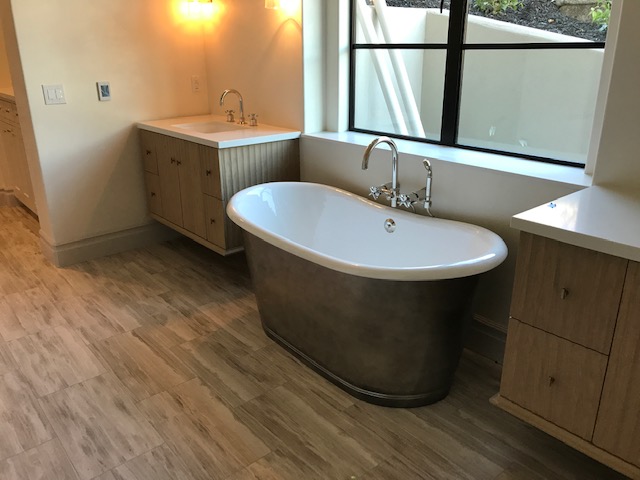 A Side View Of The Bathtub In the Bathroom