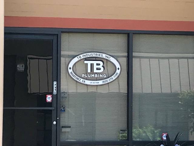 A Business Office Entrance Area With Logo