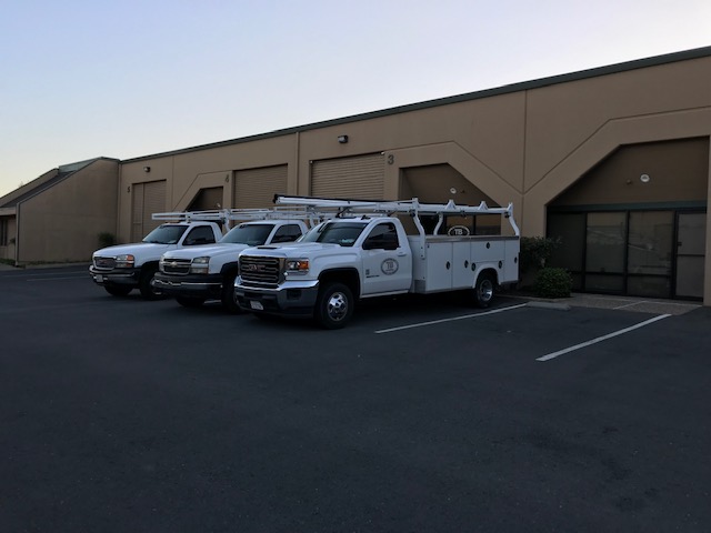 The Plumbing Service Vehicles Parked In The Office Area