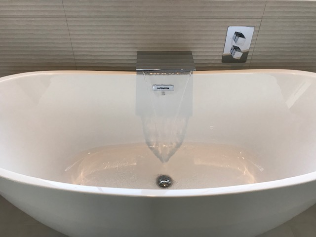 A Water Flowing From The Modern Tap
